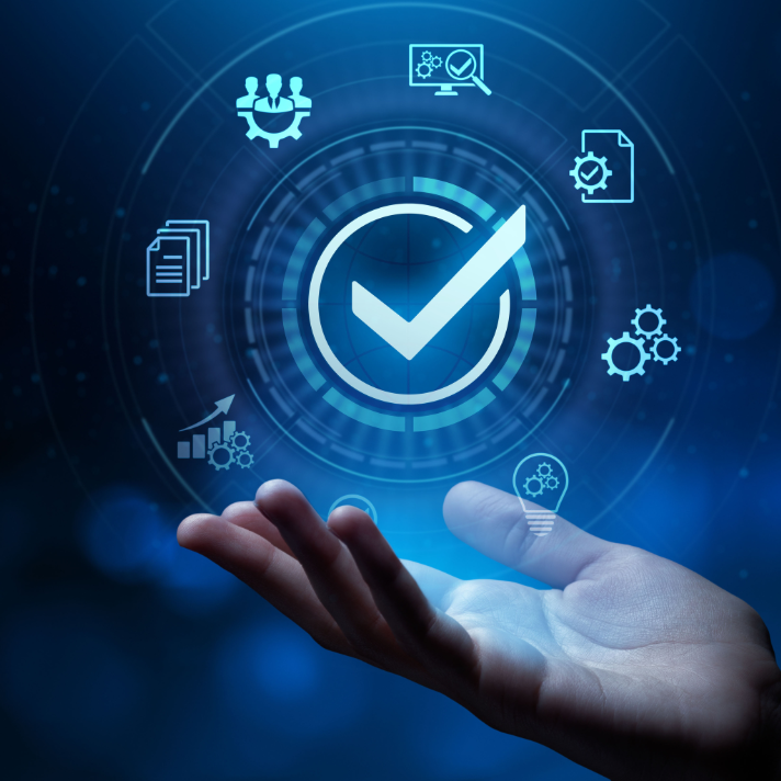 A human hand reaching upward toward a glowing blue digital interface with a large checkmark at the center and several technology-themed icons around it, set against a dark blue abstract background.