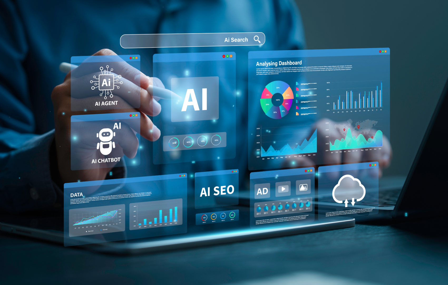 A futuristic digital interface overlay showing AI-themed dashboard panels, charts, and icons floating above a laptop, with a person's hand holding a stylus in a dimly lit office setting.
