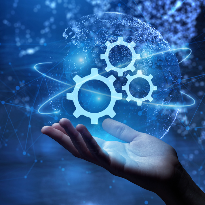 A glowing blue digital globe with three interlocking gear icons floating above an open hand, set against a dark blue abstract network background.